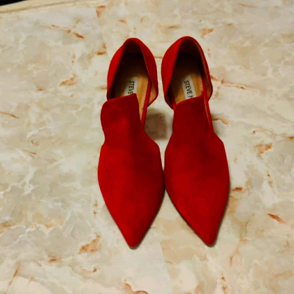 Red suede pumps